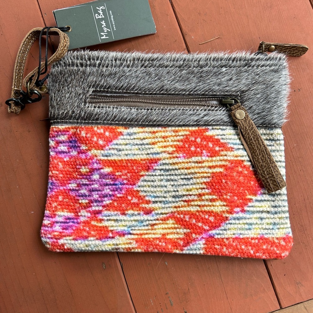Myra Wristlet NEW. 10” by 8”. Canvas back, wristlet strap